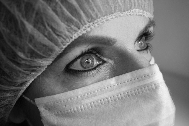 face of woman doctor wearing mask