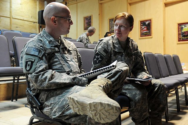 Military psychologist talking to a solder