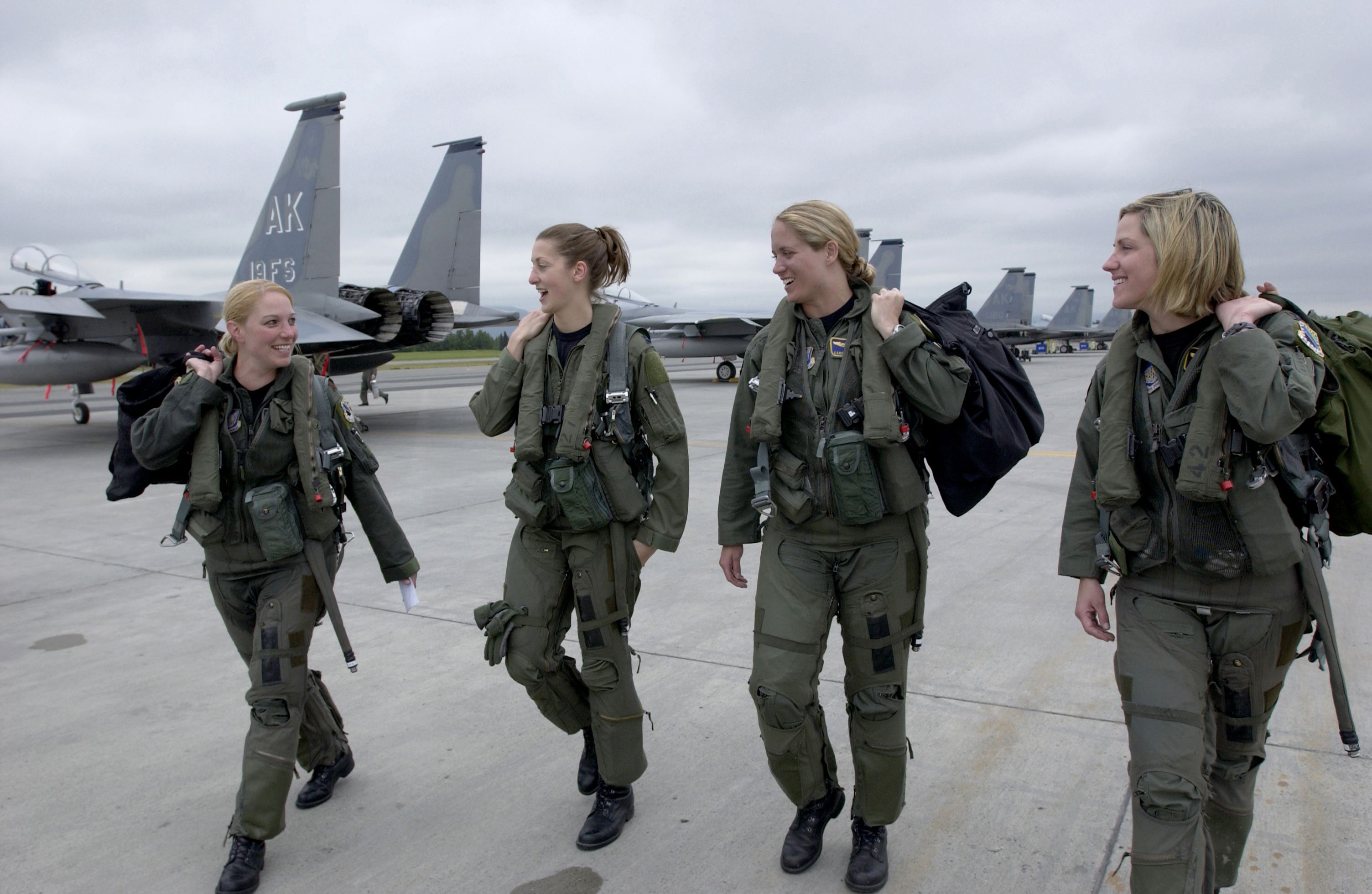 4 women military pilots walking away from jet