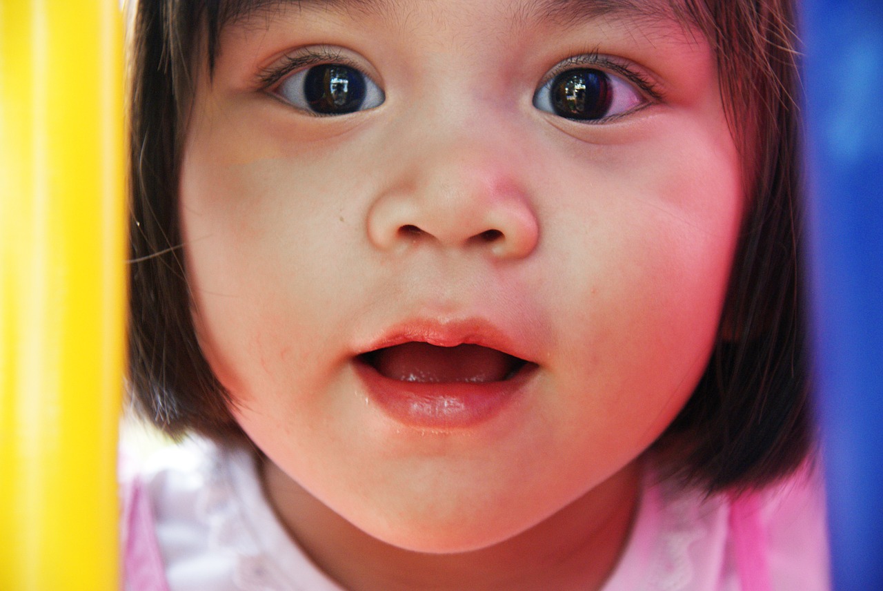 face of Asian girl looking directly at camera