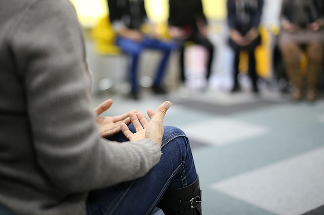 man sitting and relaxinging showing handss